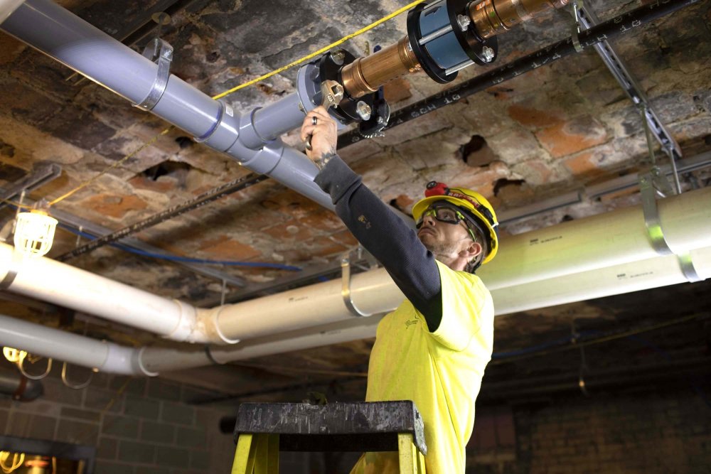 Commercial plumbing pipe system with valves and pressure gauges